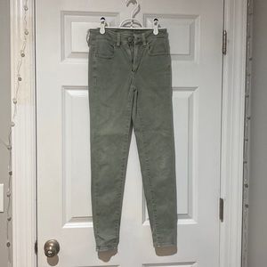 light green super stretch high rise jeggings barely worn! little bleach stain
